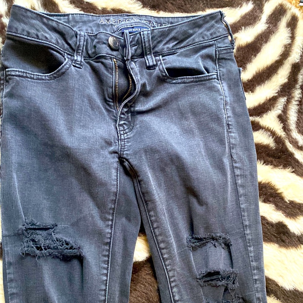 American eagle distressed black super super stretch jegging size 2